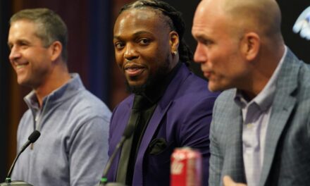The Touching Story Behind Derrick Henry’s Purple Suit
